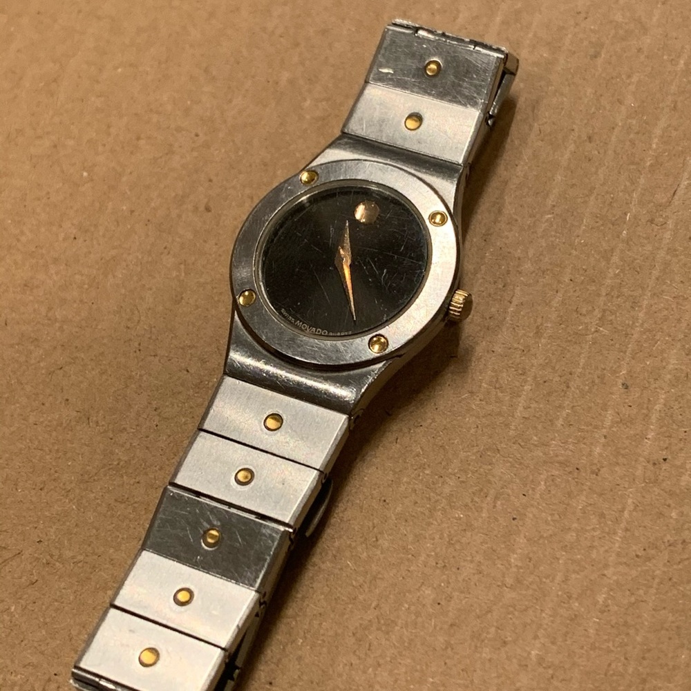 Used worn some scratches movado watch